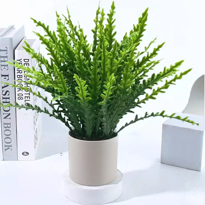 Mini planta artificial em vaso, decorativa e sofisticada, com acabamento realista, ideal para ambientes internos.